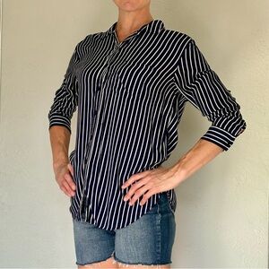 Blue and white striped, long-sleeve, button-down shirt, perfect for layering!